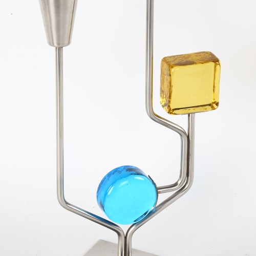 81 - A mid-century Danish steel and glass candlestick, marked Denmark to base, height 20cm