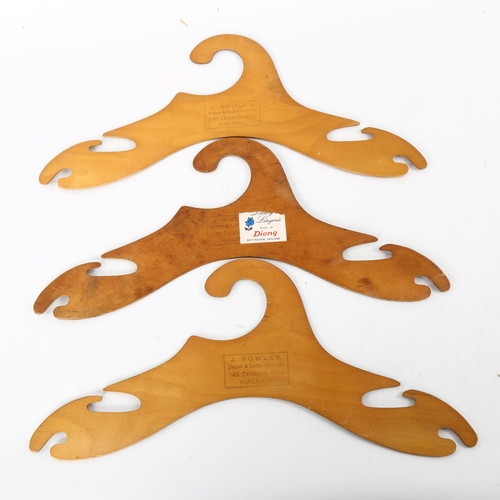 88 - A set of modernist plywood coat hangers