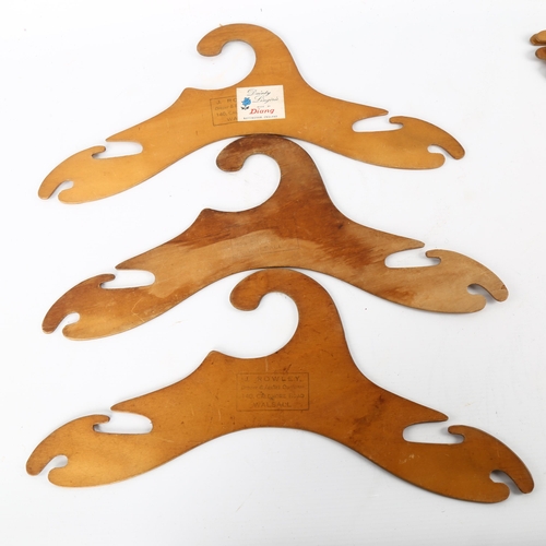 88 - A set of modernist plywood coat hangers