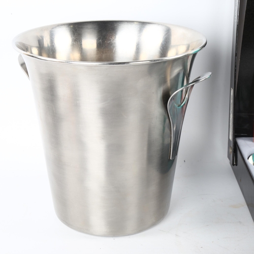 97 - Guy Degrenne, France, a stainless steel champagne bucket, maker’s mark to base and a Guy Degrenne 24... 