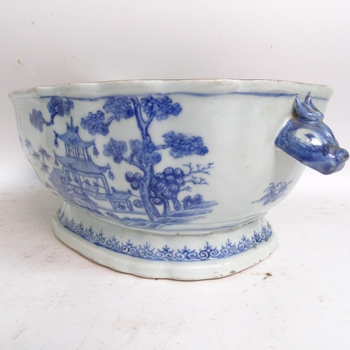 175 - A Chinese Nanking blue and white porcelain tureen and cover, with hand painted decoration, length in... 