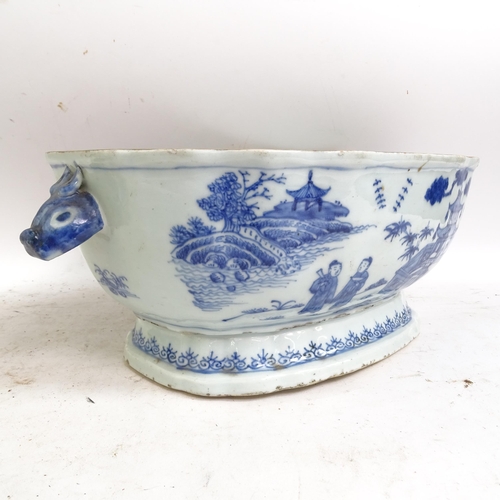 175 - A Chinese Nanking blue and white porcelain tureen and cover, with hand painted decoration, length in... 