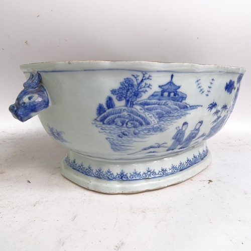 175 - A Chinese Nanking blue and white porcelain tureen and cover, with hand painted decoration, length in... 