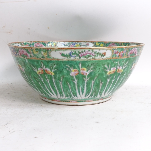 456 - A green ground Chinese bowl with stylised floral decoration, diameter 33cm