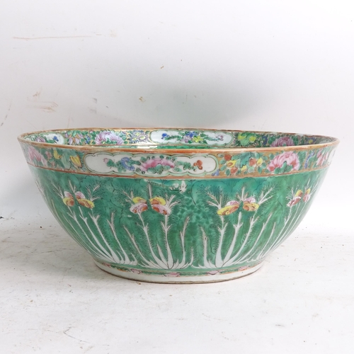 456 - A green ground Chinese bowl with stylised floral decoration, diameter 33cm