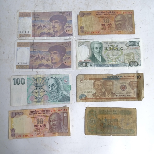 122 - A collection of various world banknotes, including American dollars, Indian, Trinidad and Tobago etc... 