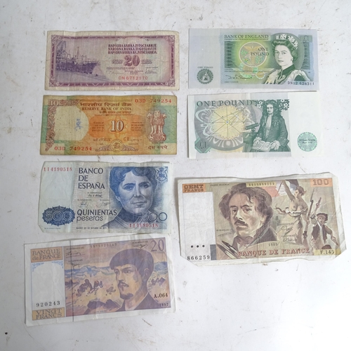 122 - A collection of various world banknotes, including American dollars, Indian, Trinidad and Tobago etc... 