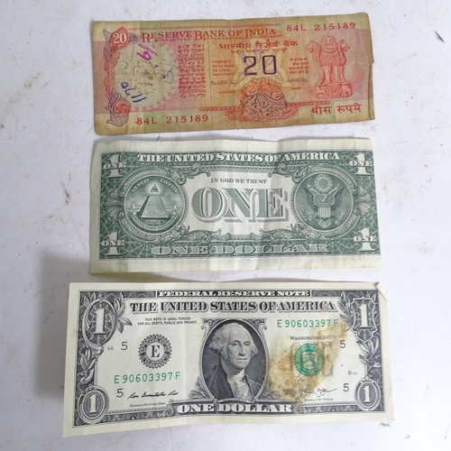 122 - A collection of various world banknotes, including American dollars, Indian, Trinidad and Tobago etc... 