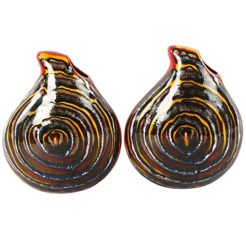 127 - Anita Harris Art Pottery, a pair of stylised pebble vases, signed and stamped to base, height 23cm