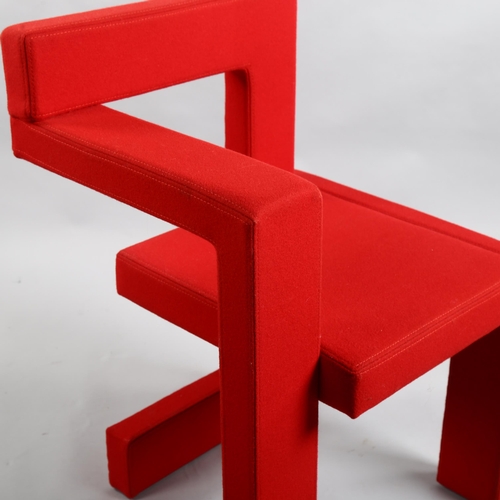 103 - Gerrit Rietveld, a Steltman chair by Rietveld Originals, the assymetrical wooden structure with red ... 