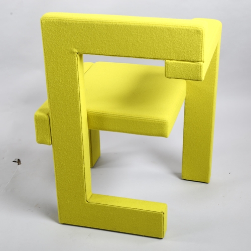 104 - Gerrit Rietveld, a Steltman chair by Rietveld Originals, the assymetrical wooden structure with yell... 