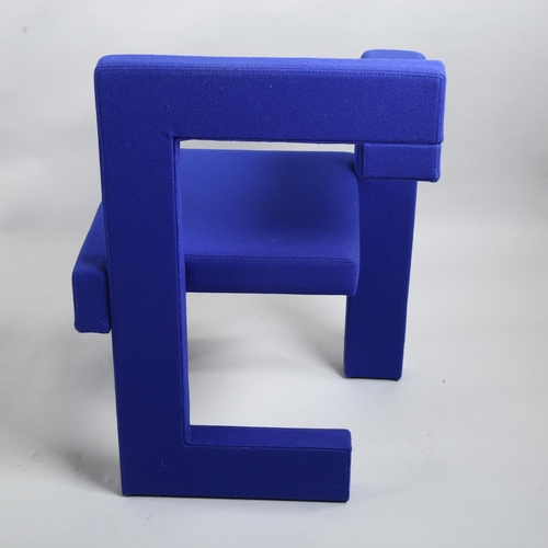 105 - Gerrit Rietveld, a Steltman chair by Rietveld Originals, the assymetrical wooden structure with blue... 