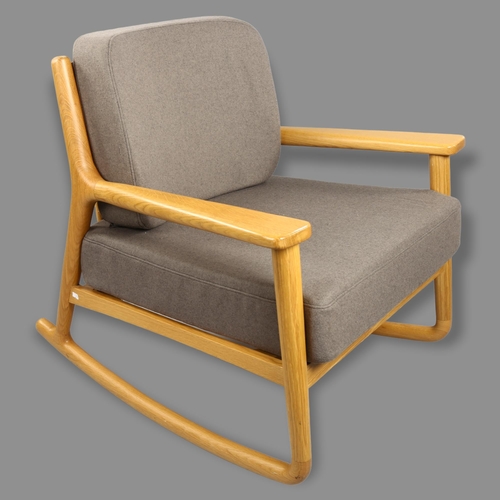 125 - Samuel Wright for OCEE, a Noah sculptural oak rocking chair in the Danish mid-century manner, height... 