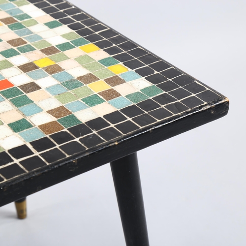 17 - A 1950s' mosaic tile top coffee table, with ebonised surround and legs, 93 x 47cm, height 42cm