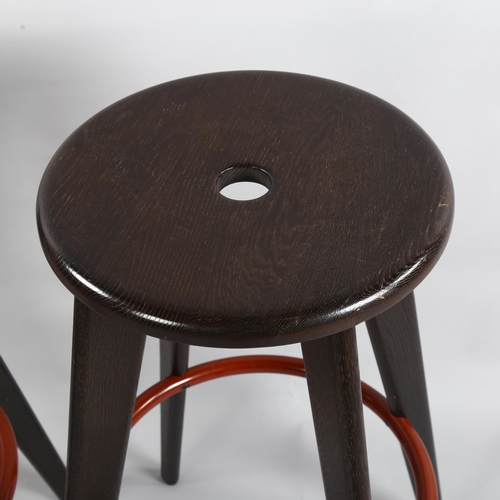 65 - Jean Prouve, a pair of Tabouret Hallway stained oak barstools by Vitra, height 78cm