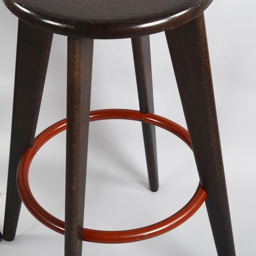 66 - Jean Prouve, a pair of Tabouret Hallway stained oak barstools by Vitra, height 78cm