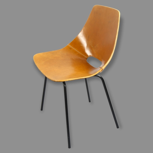 75 - Pierre Guariche, France, a Tonneau chair, the leather clad shell seat on black tubular steel legs, m... 