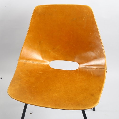 75 - Pierre Guariche, France, a Tonneau chair, the leather clad shell seat on black tubular steel legs, m... 