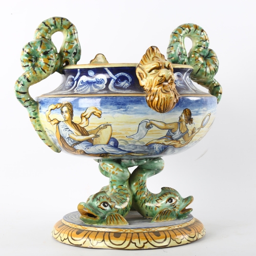 150 - A large 19th century Maiolica dolphin comport with sea snake handles, height 36cm