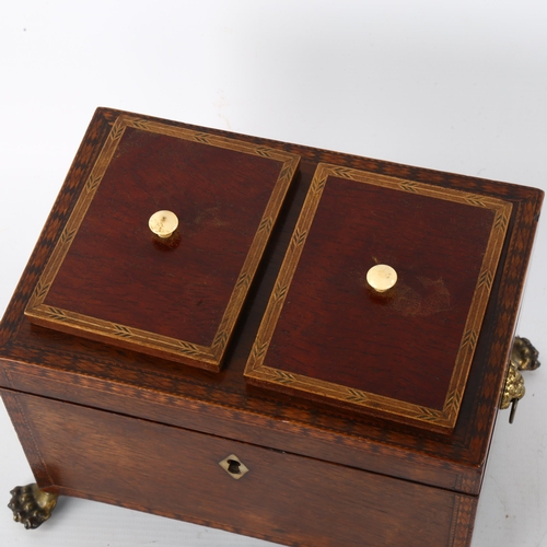 157 - A Regency exotic wood tea caddy, possibly partridge wood, with inlaid parquetry bands, inner lids wi... 