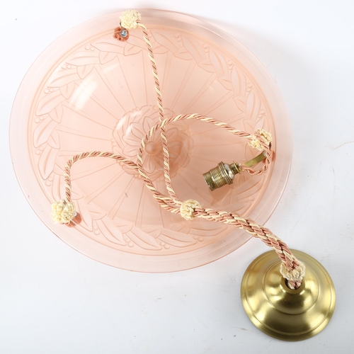 175 - A French pink glass plafonnier, relief moulded geometric design, new cords, diameter 35cm