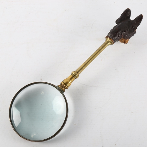 239 - A brass magnifying glass, with carved and painted wood handle in the form of a French Terrier, lengt... 