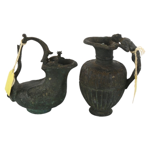 244 - 2 small Roman heavy cast patinated bronze jugs, largest height 11cm (2)