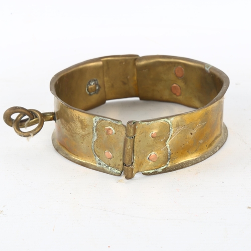 249 - A brass dog collar, internal diameter 12cm