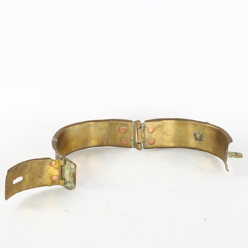 249 - A brass dog collar, internal diameter 12cm