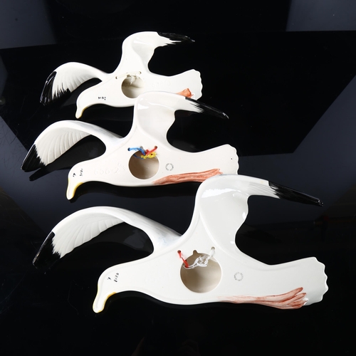 265 - A set of 3 Beswick wall-hanging Gulls, with makers stamp, model nr 658-1-2-3, longest 36cm