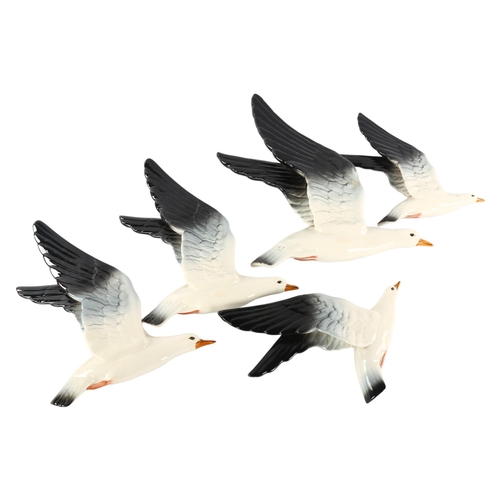 266 - A set of 5 Beswick wall-hanging gulls, with makers marks, model nr 922-1-2-3, largest height 31cm.