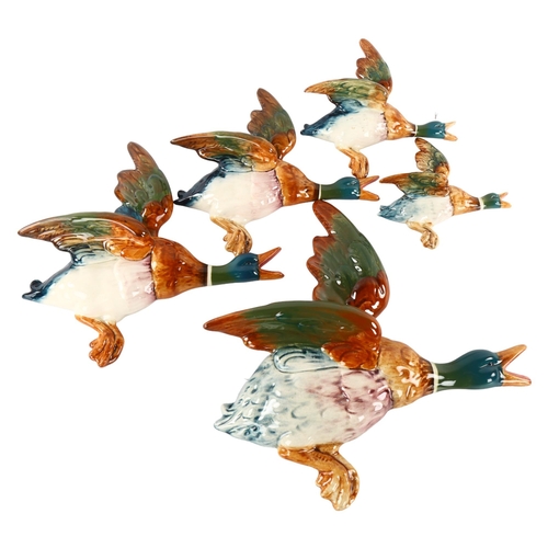 267 - A set of 5 Beswick wall-hanging Ducks, with makers marks, model nr 596-1-2-3-4, largest unmarked, lo... 