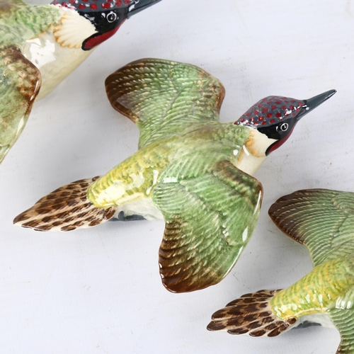 270 - A set of 3 Beswick wall-hanging Woodpeckers, model 1344-1-2-3, makers marks, longest 20cm