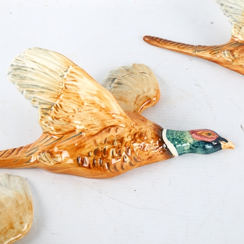 272 - A set of 3 Beswick wall-hanging Pheasants, model 661-1-2-3, makers marks, longest 31cm