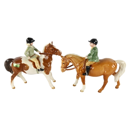 275 - 2 Beswick models of girls on ponies, makers stamp, height 14cm