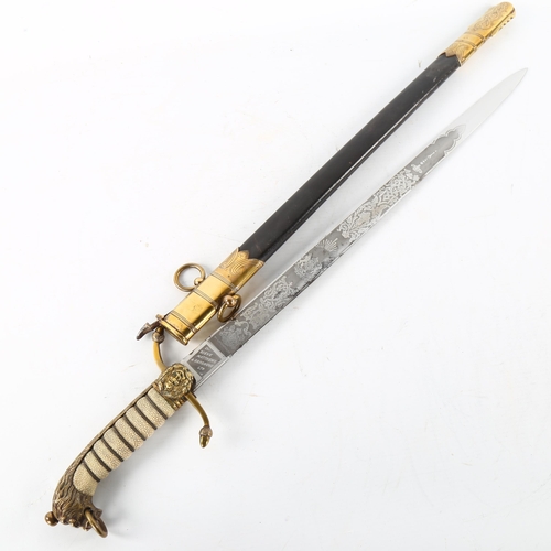 283 - An Edwardian Navy Officer's dirk, with etched blade and gilt mounts, by Gieve Matthew & Seagrove, or... 