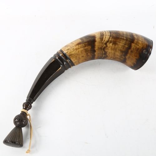 284 - A Victorian Scottish power horn with carved thistle stopper, length 37cm