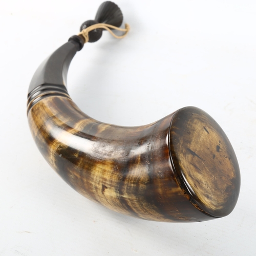 284 - A Victorian Scottish power horn with carved thistle stopper, length 37cm