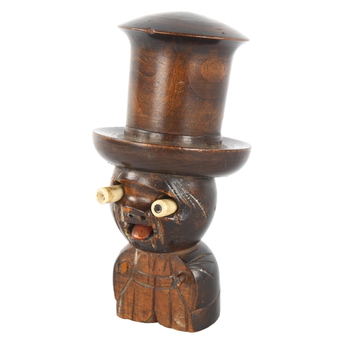 288 - A novelty carved wood and bone dice shaker figure with screw-on hat, containing original bone dice, ... 