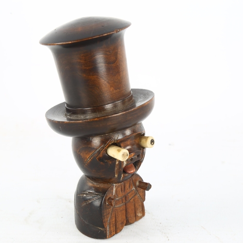 288 - A novelty carved wood and bone dice shaker figure with screw-on hat, containing original bone dice, ... 