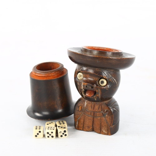 288 - A novelty carved wood and bone dice shaker figure with screw-on hat, containing original bone dice, ... 