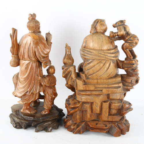 289 - 2 Chinese carved wood figures, height 27cm (2)