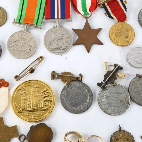 293 - A trio of Second World War Service medals, a 1911 - 12 King's medal, and a group of other commemorat... 