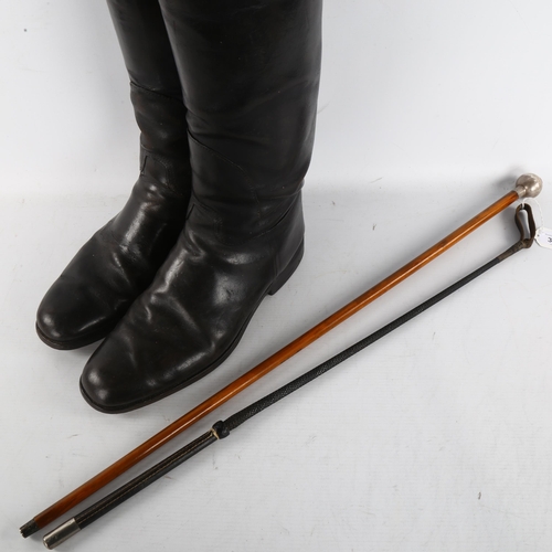 303 - A 1946 silver topped Devonshire Regiment swagger stick, a pair of military leather boots and a horse... 