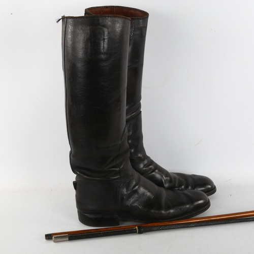 303 - A 1946 silver topped Devonshire Regiment swagger stick, a pair of military leather boots and a horse... 