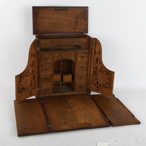 304 - An 19th century carved walnut stationary box, A/F,  height 25cm