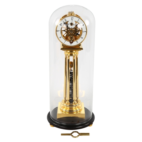 308 - A collector's clock, single-train skeleton type movement, with spring housed between 6 columns, enam... 