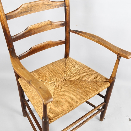 180 - Philip Clissett, an Arts and Crafts ladderback armchair in ash with rush seat, ca 1890, height 105cm