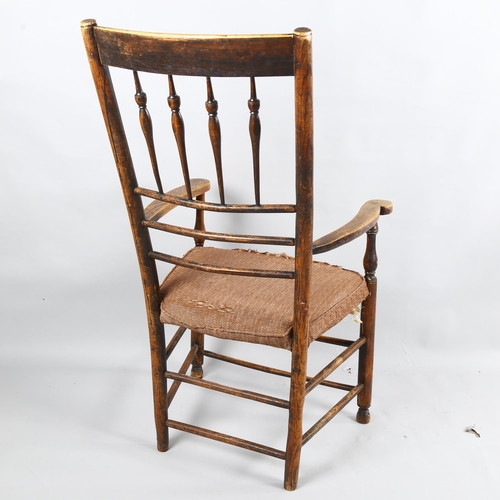 181 - Philip Clissett, an early spindle back armchair in ash, the top of each upright stamped PC, ca 1890,... 