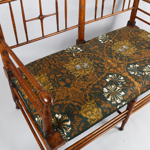 193 - Liberty and Co, an Arts and Crafts Argyll 2 seater bench settee, ca 1890, later upholstered with Lib... 